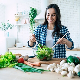 Woman making a salad