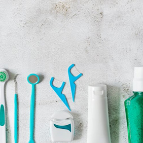 Assortment of oral hygiene tools viewed from above