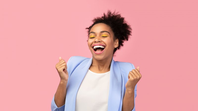 woman smiling and happy about smile makeover